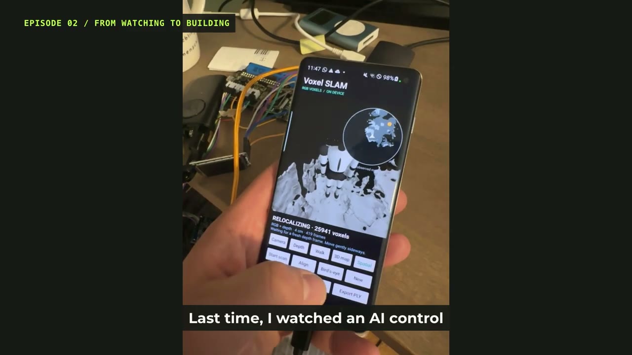 The old Samsung phone displays the room-mapping interface during the original experiment.