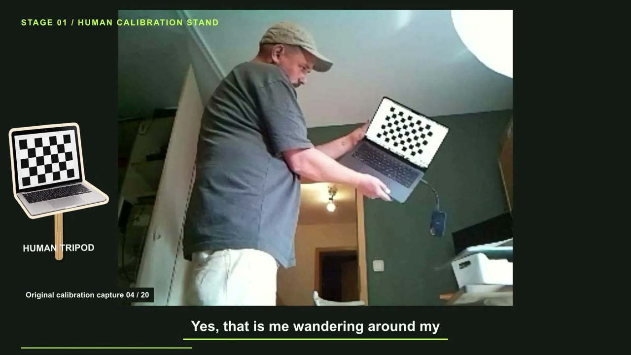 Using a checkerboard displayed on a laptop as a calibration target in the real room.